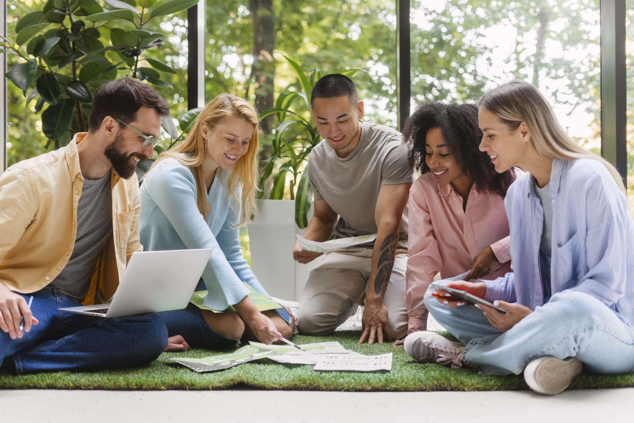 people working tech brand together